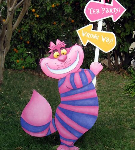 cheshire cat holding a sign